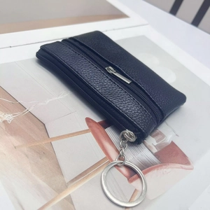 Mini portamonete nero in pelle martellata con doppia cerniera e anello portachiavi in metallo
