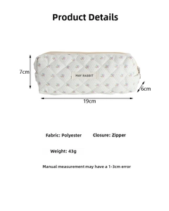 Detailed view of floral quilted makeup bag with dimensions and product specifications