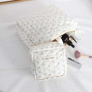 Quilted floral cosmetic bag set with MAY RABBIT tag in cream white