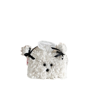 Cute white plush dog-shaped tissue box cover with black bows and soft fleece texture