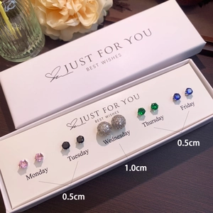 Detailed view of S925 silver heart and zircon stud earring set in a gift box