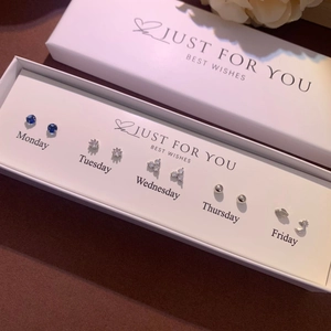 Detailed gift box view of five pairs S925 silver stud earrings with heart and planet designs