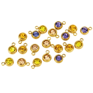 Close-up of multicolor faceted birthstone charms with stainless steel loops for DIY jewelry