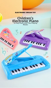 Close-up of 22-key children's piano toy with two play modes in colorful Macaron shades