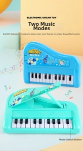 Detail of 13-key children's electronic piano toy featuring dual mode function in blue