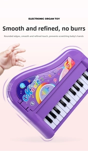Macro shot of 13-key purple toy piano with smooth rounded edges for safe infant play