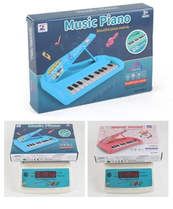 Detail showing actual weight of blue and pink 22-key kids musical electronic piano toy