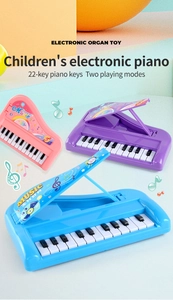 Close-up of colorful 22-key kids electronic pianos with dual play modes and flip cover