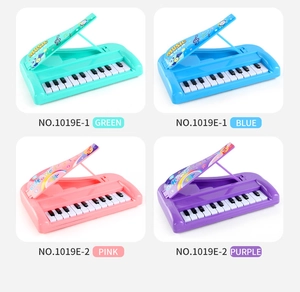 Detailed grid of 13-key toy pianos in green, blue, pink, and purple colors for children