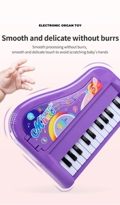 Detail showing the smooth surface and burr-free edges of the 13-key purple toy piano