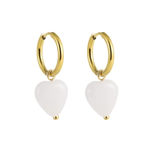 Detail of 18K gold hoop earrings featuring polished heart-shaped white natural stone pendants