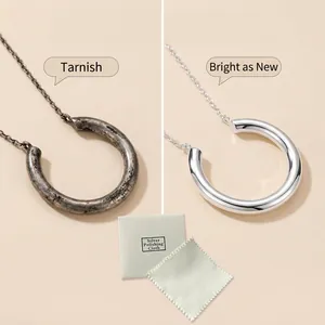 White silver polishing cloth 8x8cm with before and after cleaning effect on necklace