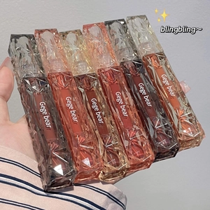 Detailed set of six diamond-textured lip glazes with high-shine mirror finish effect