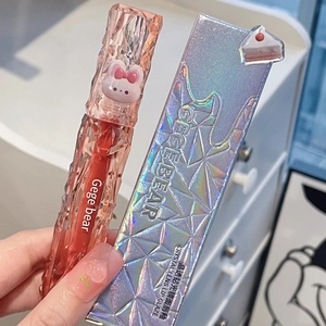 Close-up of diamond mirror lip glaze with pink lattice tube and cute rabbit cap detail