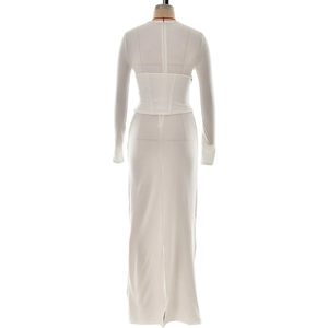 Detailed back view of a white long-sleeve maxi dress with corset waist and hidden zipper