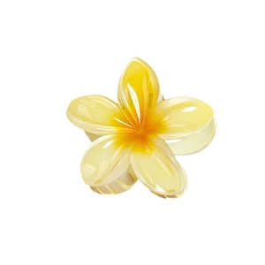 Plumeria flower hair claw clip with yellow gradient finish for elegant updos