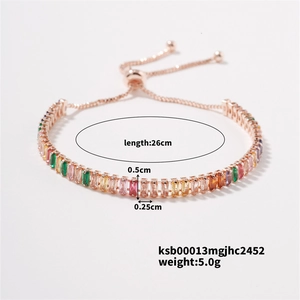 Detail of colorful birthstone tennis bracelet with slider clasp and rose gold finish