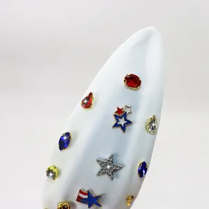 Detail of knotted headband featuring sparkling red blue rhinestones and American flag stars