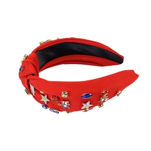 Knot-style red headband featuring colorful rhinestones and decorative metallic stars