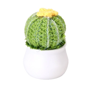 Handmade crochet cactus succulent in a white ceramic pot for desk decoration