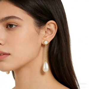 Elegant 18K gold plated stainless steel long drop earrings with white teardrop pearls