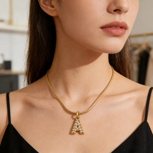 Golden stainless steel snake chain necklace with sparkling crystal letter A pendant