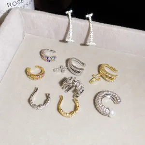 Set of sparkling zircon-encrusted ear cuffs in gold and silver tones for non-pierced ears