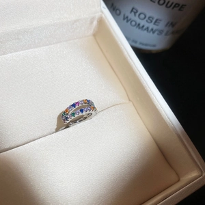 Detail view of double-layer silver ear cuff featuring colorful zircon inlay sparkles