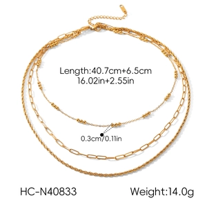 Detailed view of triple-layered 18k gold plated stainless steel necklace with measurements