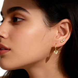 Elegant S925 sterling silver gold-plated heart stud earrings with small zircon stones