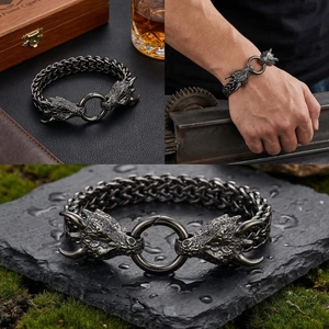 Detail view of retro dragon head steel bracelet with a vintage industrial metal chain
