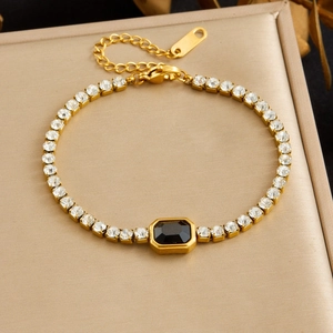 Elegant gold-plated stainless steel bracelet featuring cubic zirconia and a black octagonal stone