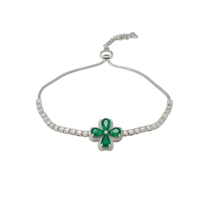 Elegant silver-toned tennis bracelet with a vibrant green zircon flower centerpiece