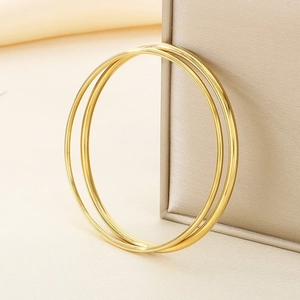 Minimalist gold-plated stainless steel round wire stackable bracelets for stylish women