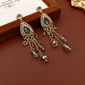 Vintage gold floral tassel earrings with smoky grey crystals and teardrop charms