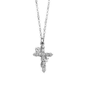 Close-up of silver cross pendant with clear cubic zirconia and tiny rose detail