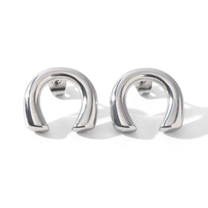 Detailed view of polished silver-tone U-shaped titanium steel stud earrings for women