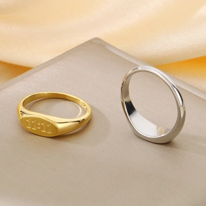 Minimalist stainless steel signet ring with engraved 11:11 lucky angel number.