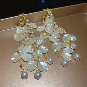 Elegant acrylic flower pearl tassel earrings in gold finish
