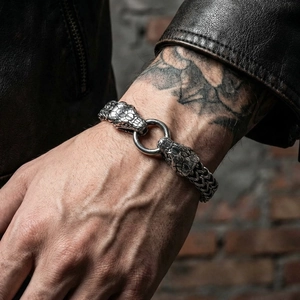 Vintage stainless steel double snake head bracelet with stone-set punk rock design
