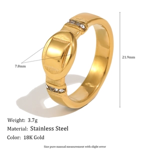 Detail of 18K gold-plated stainless steel ring with oval accent and stones