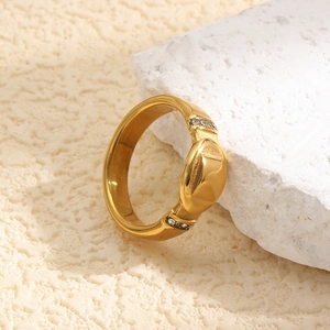 Elegant 18K gold plated stainless steel ring featuring an oval dome and pave CZ accents
