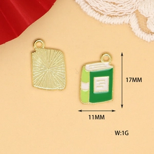 Detailed view of green enamel book charm showing 17mm height and 11mm width dimensions.