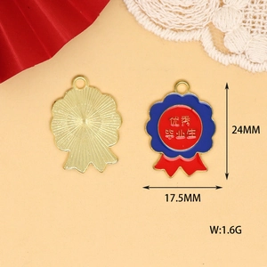 Macro view of medal alloy pendant with 'Outstanding Graduate' text for graduation DIY
