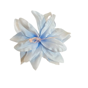 Elegant light blue fabric lily flower hair clip featuring delicate pearl stamen accents