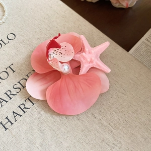 Elegant pink orchid flower hair clip with pearl and starfish accent for sweet girls