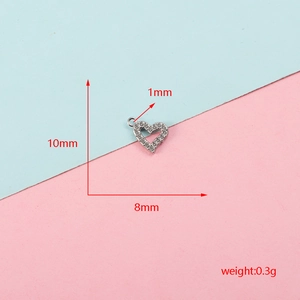 Detailed view of a small heart-shaped zircon charm with dimensions and weight info.