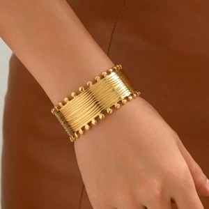 Vintage 18K gold plated wide cuff bracelet with wavy texture and beaded edge
