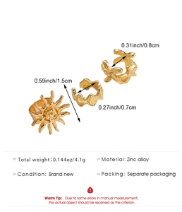 Detailed view of three gold ear cuffs featuring sun, starfish and wave patterns with dimensions