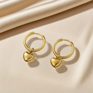 Boucles d'oreilles créoles dorées en acier inoxydable avec pendentifs cœur lisses